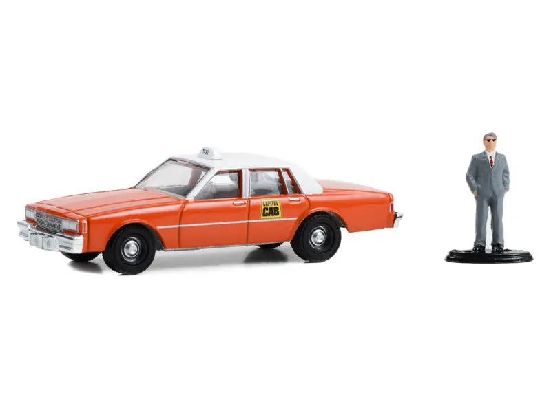 1981 Chevrolet Impala Capitol Cab Taxi W/ Man In Suit (The Hobby Shop Series 15) Diecast 1:64 Scale Model - Greenlight 97150B 1